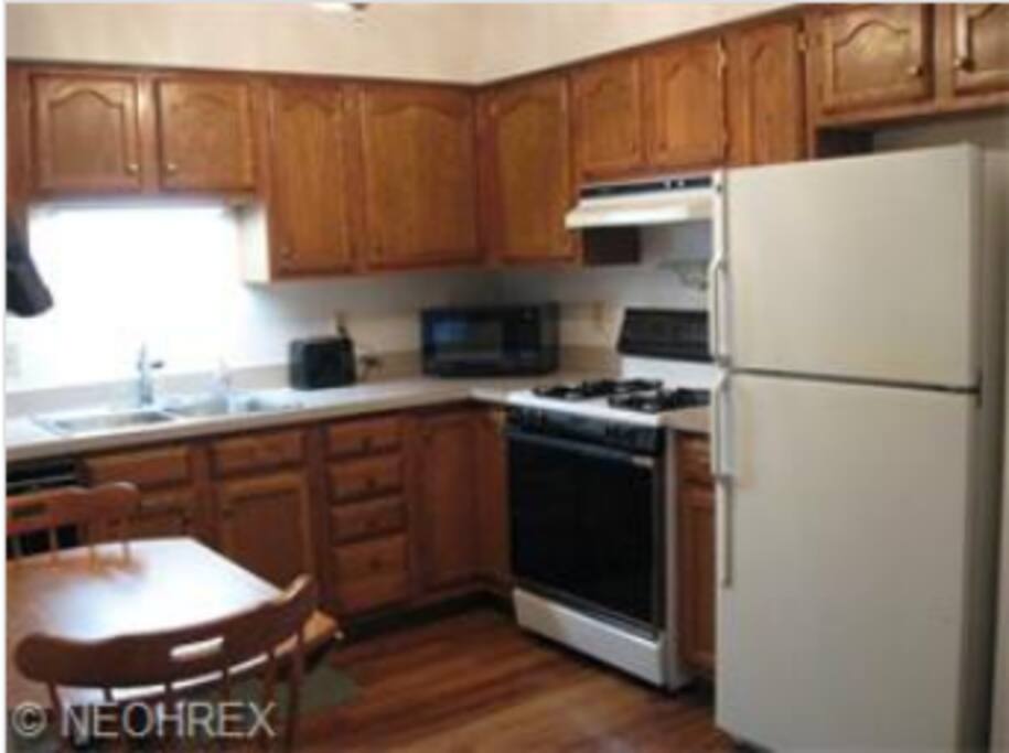 Fully stocked kitchen with all essential appliances