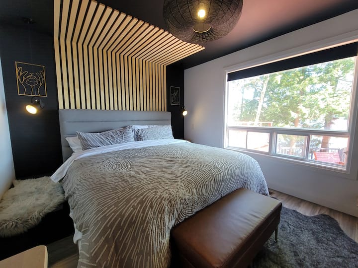 Main floor primary bedroom with East Lakeview
King - Serta hybrid memory foam mattress