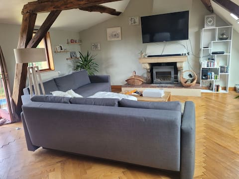 The house with red shutters.