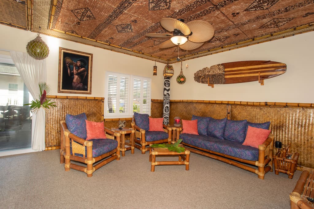 Bamboo living room set with real tapa cloth, lauhala mat, bamboo ceiling and wall trim installed by Gecko. Tropical lighting, vintage tiki from the old Hawaiian Hut.