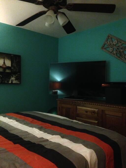 and a 56' flat screen with surround sound