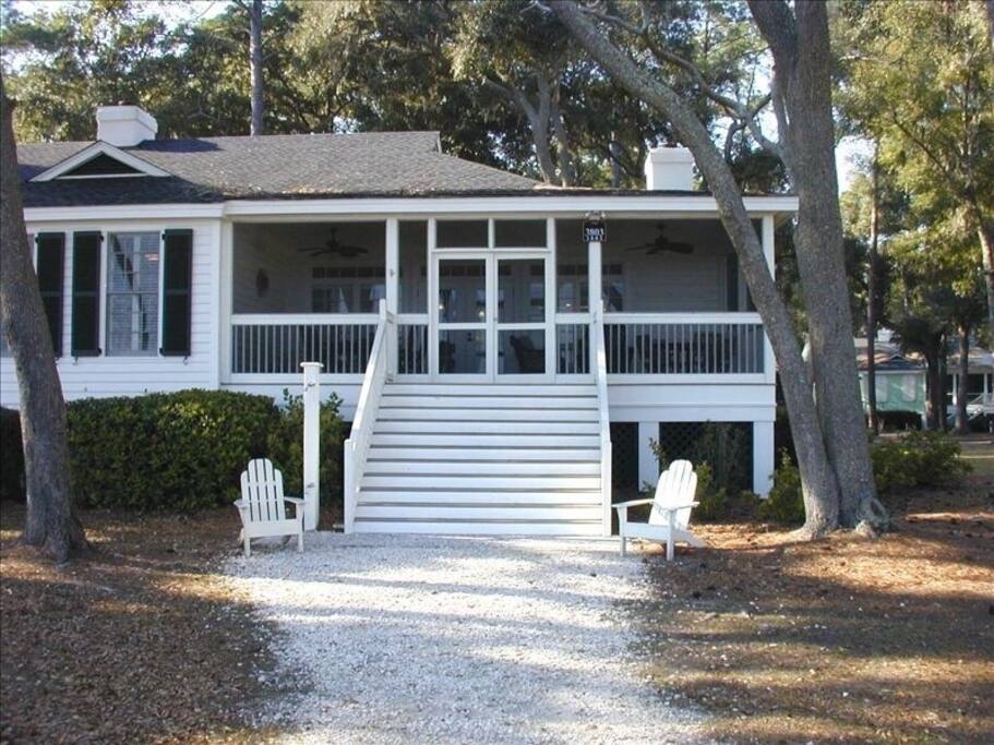 Large Screened porch seats 10 at two tables and 5 in lounge chairs. Outdoor shower and Weber charcoal grill make summertime living easy