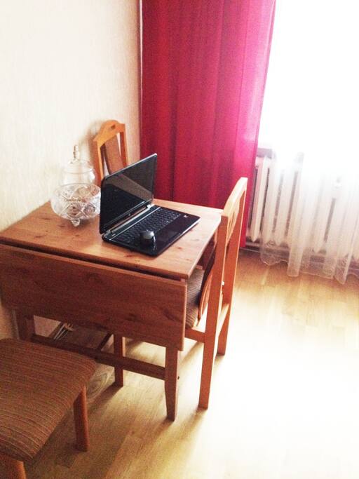 The living room with a workspace