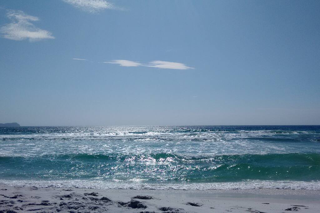 praia em frente a casa