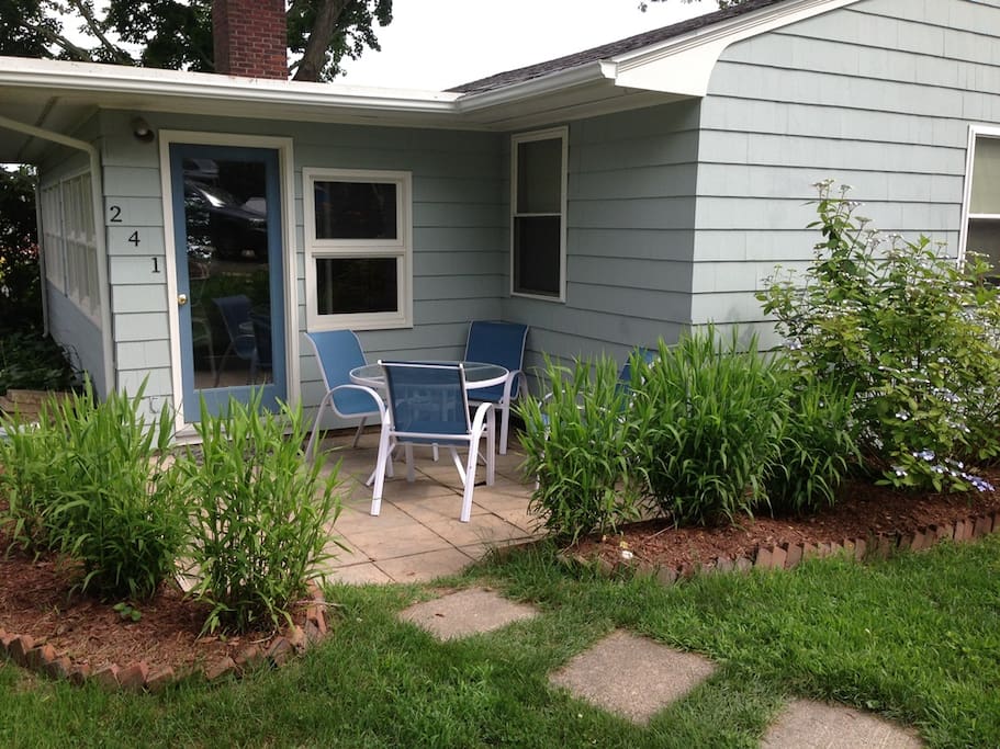 Back of house with patio