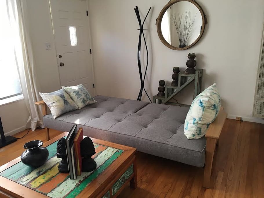 Another shot of living room showing sofa turned to bed.
