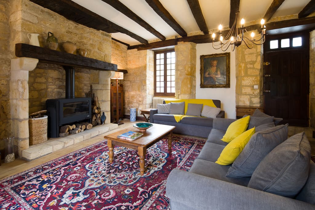 Comfortable sitting room with log burner and satellite TV (UK, French and most European channels).