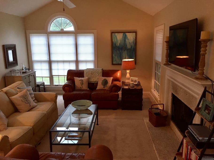 Large living room with lots of natural light when blinds are open