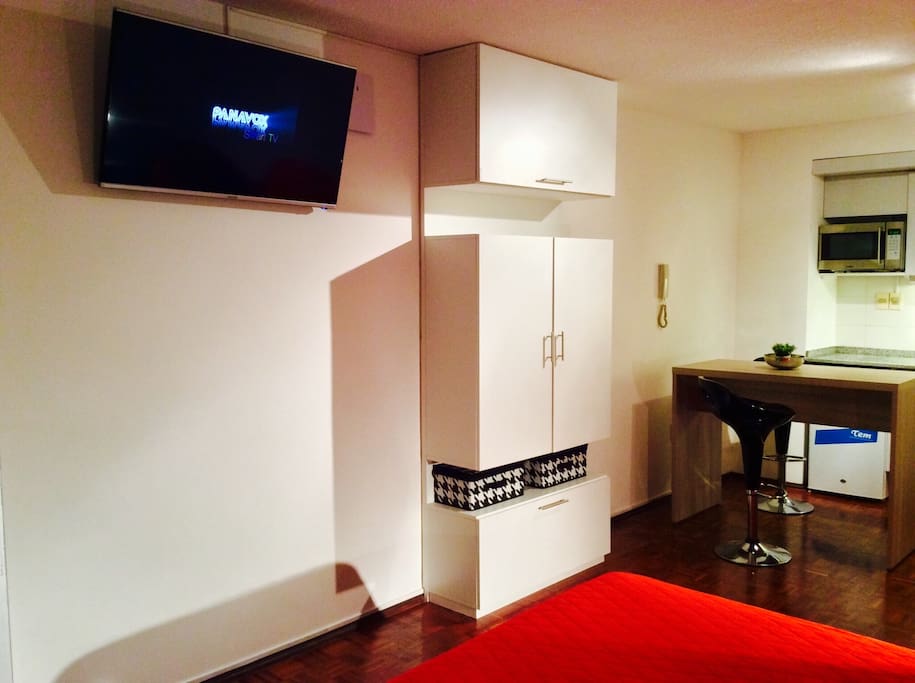 Flat tv and wardrobe