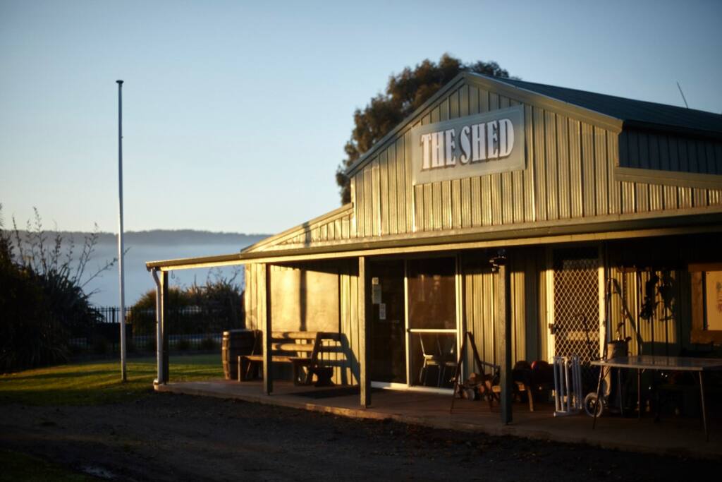 The Shed sleeps 28. Large common room, dining facilities, commercial kitchen, bar, wood fire, pool table, table tennis. All under the same roof as bathrooms.