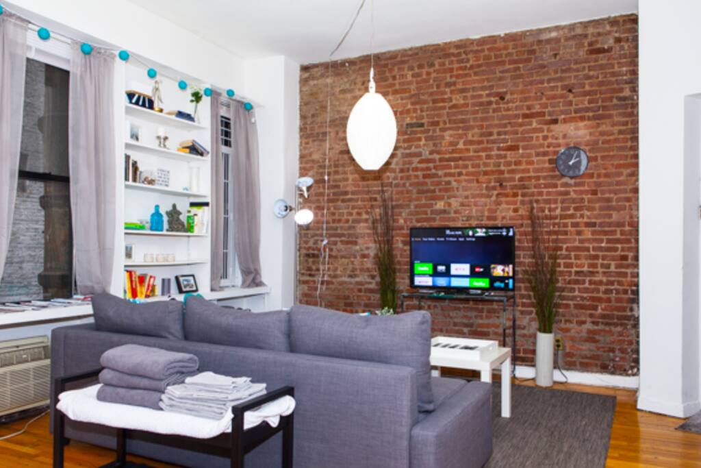 Living room fully stocked and TV has Hulu, Netflix, HBO and MUCH MORE
