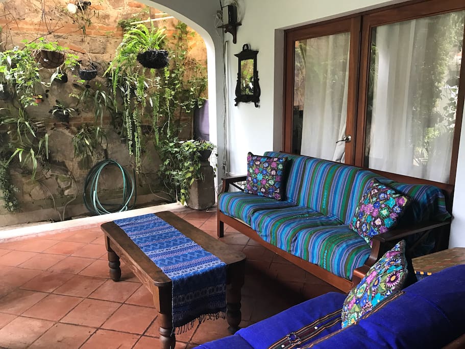 Outdoor living room open to Garden