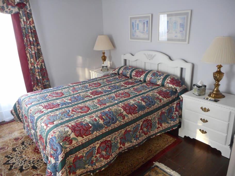 Ray's Room is upstairs. It has a Queen size bed, an antique chair and lamp for reading, a dresser, a large closet, and the large shared bath down the hall.