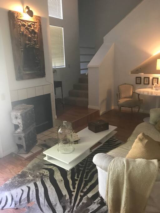 Fireplace with fire logs provided in season