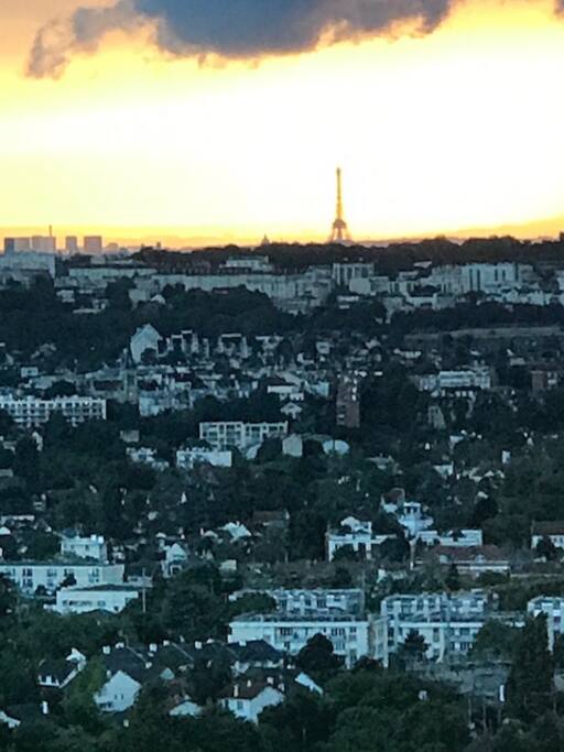 Eiffel tower view from all windows on a romantic dreamy night.