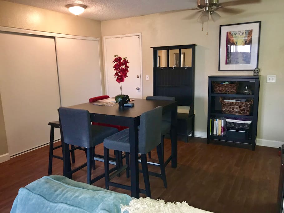 View from the living room into the dining room area. We have fun kid or adult friendly board and card games!