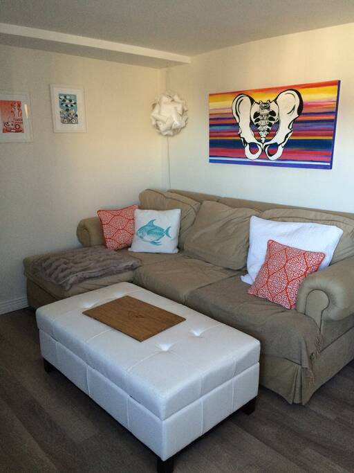 Living area- sectional sofa and storage ottoman (sleeps one)