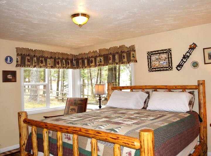 The second bedroom features a king bed and more touches from Yellowstone.