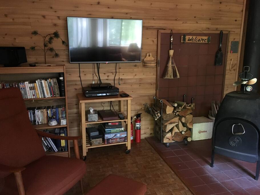 Cozy livingroom with a woodstove, TV, DVD and CD players. Lots of puzzles & games too.
