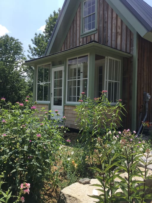 Little house... sun porch and pocket garden in July