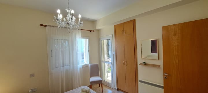 Bedroom 2 has swimming pool and garden view 