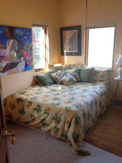 Comfy queen sized bed and natural light