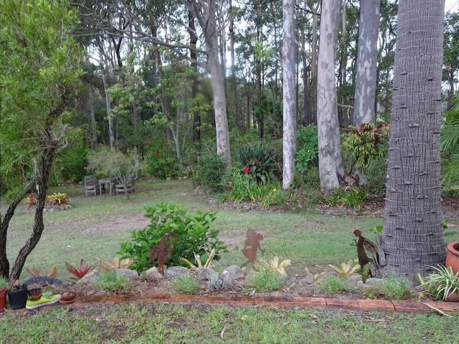 Beyond and in the gardens is a Majestic forest of spotted gum trees.