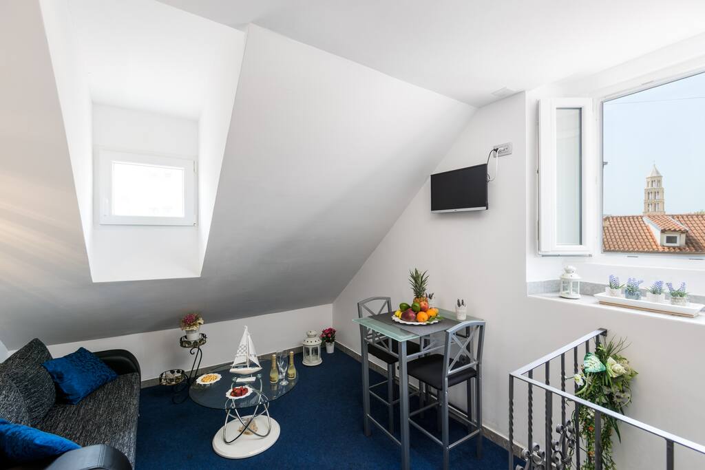 Luminous Living Space with Sofa, Dining Area, LCD TV