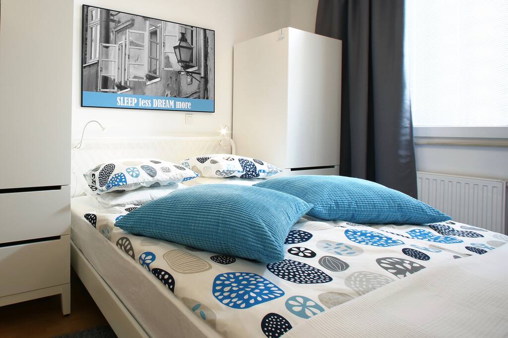 Comfy king size bed with high quality mattress for your sweet dreams. Blackout curtains will let you sleep in without waking up by daylight.