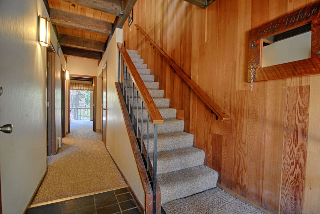 Entry area, stairs and hall to lower level rooms