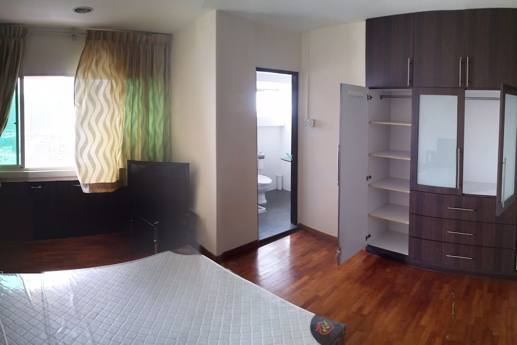 Master room with bathroom and spacious wardrobe.