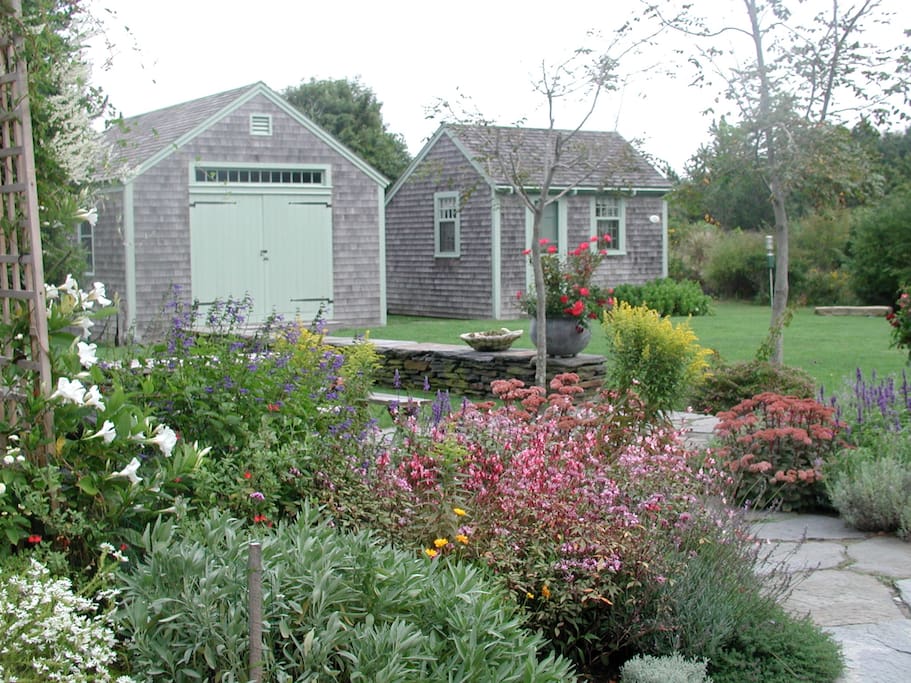 Gardens looking to Barn and Fish House