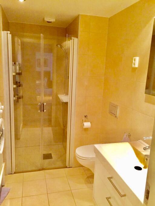 Bathroom with washing and drying machine