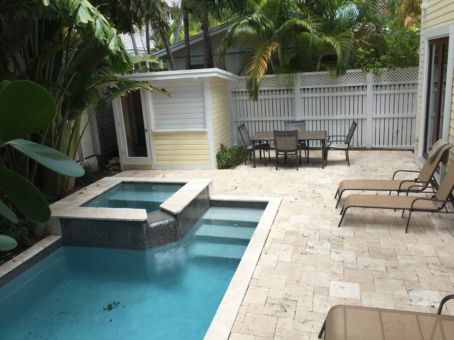Heated spa and pool with waterfall