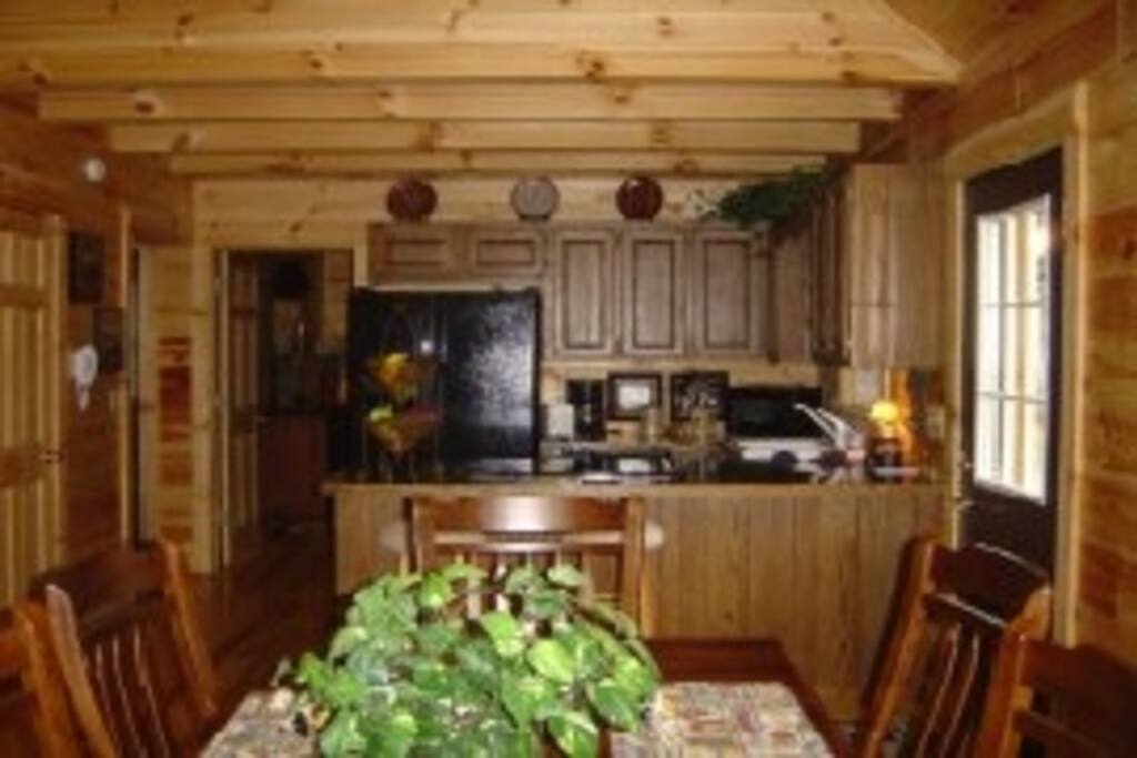 Full kitchen, and dining room table for six