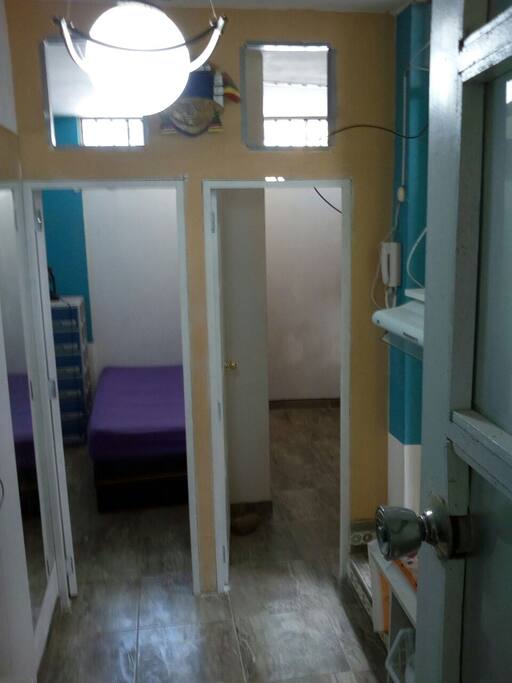 Vista de los dos dormitorios con acceso desde el ambiente multiuso. Servicio Wifi.