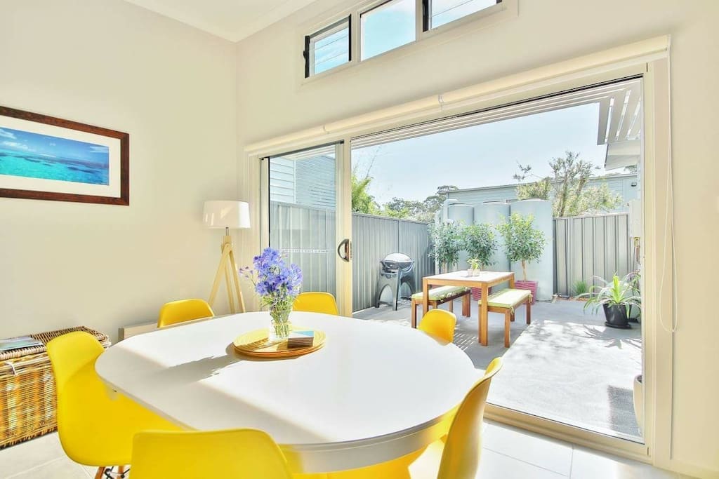 Bright and spacious dining area leading to the private courtyard
