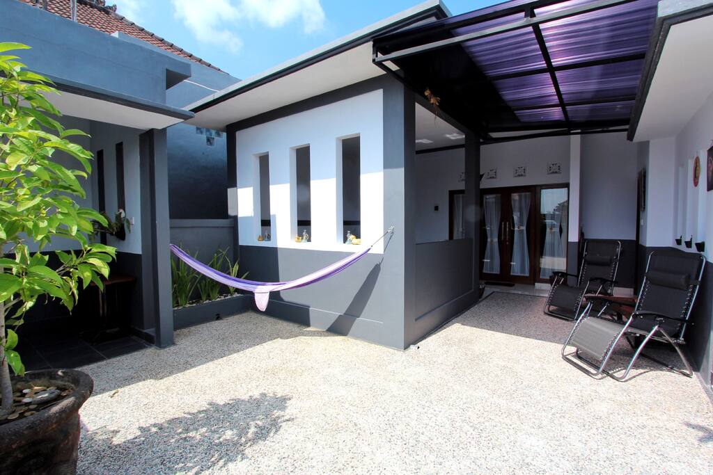 View of entrance, sun chair, living area and bedroom