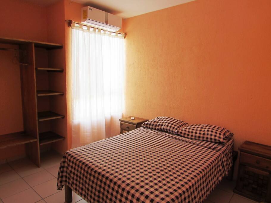 Bedroom 1; one double bed, closet, A/C & two buroes