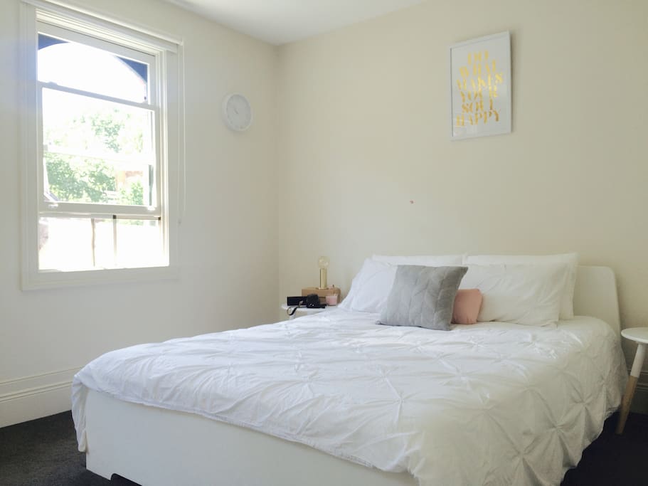 Beautiful natural light streams into the bedroom.