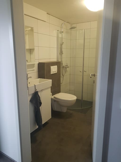 Bathroom with shower & washing machine...