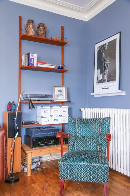 Cozy living room corner with a vinyl record player.