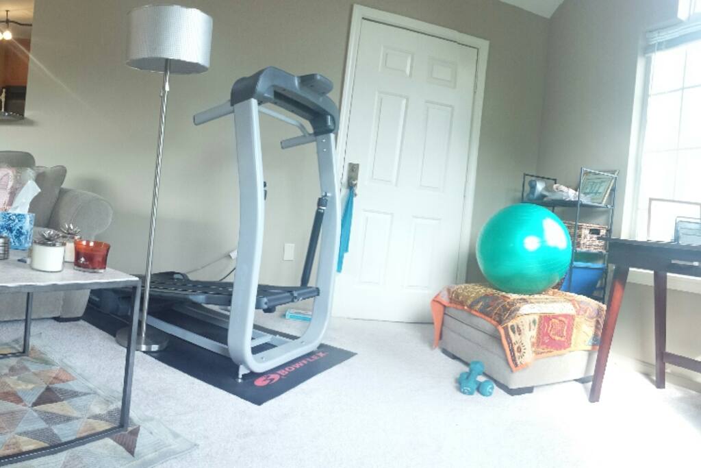 Living space and furniture including personal gym. Dining table opens out or closes depending on desired size. Well lit!