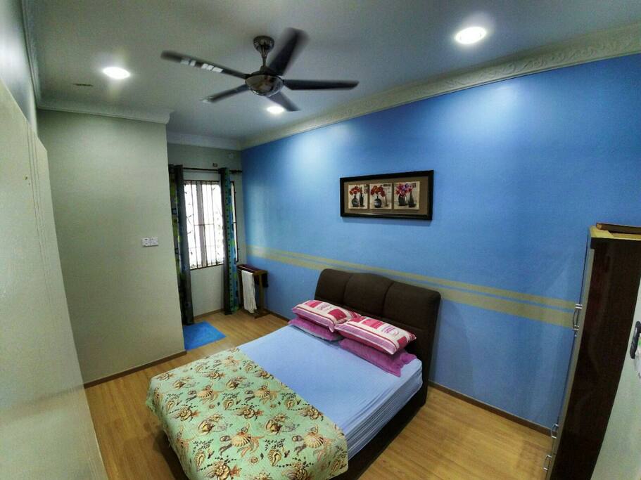 Queen size bed with attached bathroom