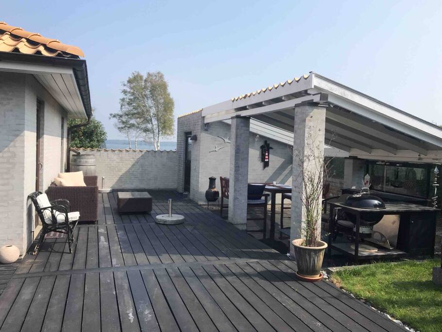 Terrace - backside of the house. Perfect cover makes this a cozy corner