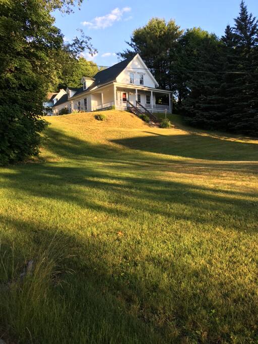 The house sits on 1/2 an acre at the top of a hill above the lake