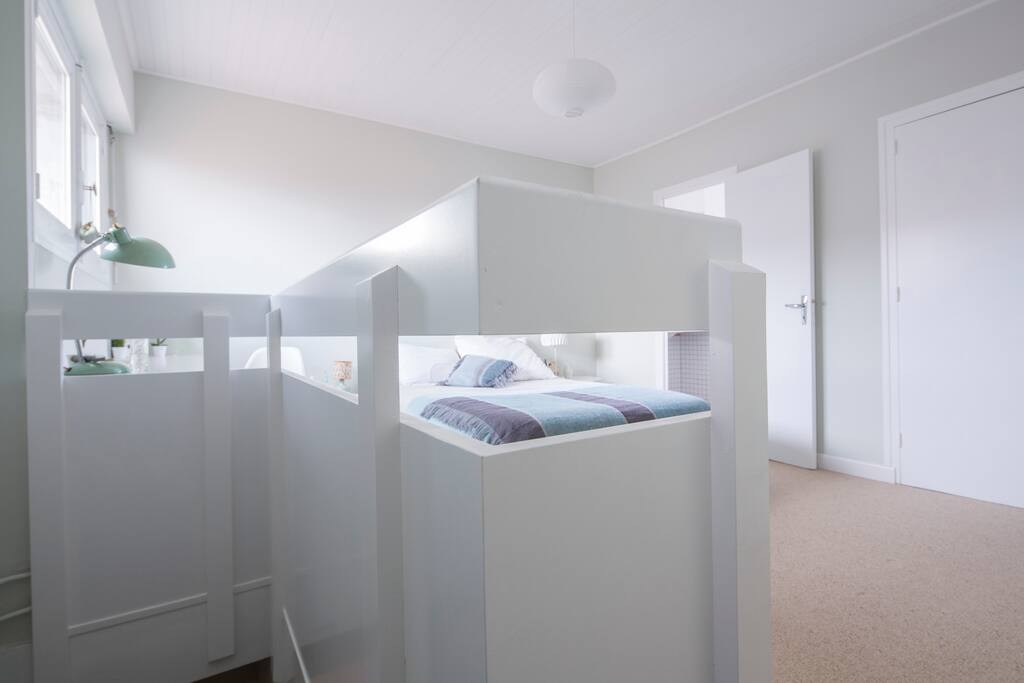 This room is on the top floor of the building and has little staircase to the room. Stairs and floors are covered with comfortable carpet.
