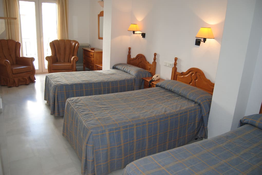 Habitación triple - tres camas