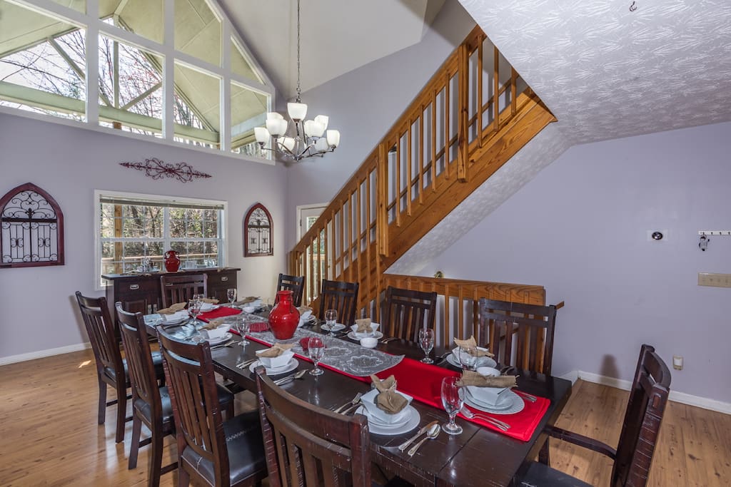 Large spacious dining table seats 12 and is open to kitchen and living room