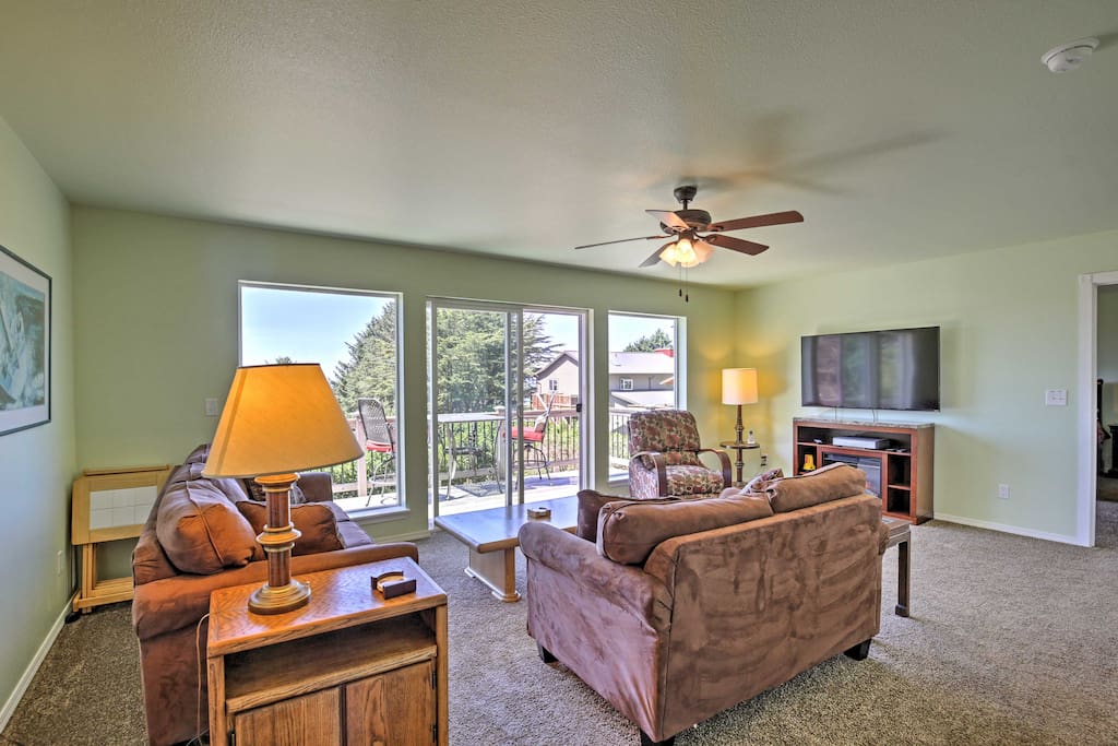 The living room makes for the perfect area to kick back with plush sofas and a massive flat-screen TV so you can watch all your favorite Netflix shows.